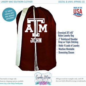 May include: A maroon laundry bag with a white "AM" logo and the name "JOHN" printed below. The bag is 30 inches by 40 inches and has a 2-inch reinforced shoulder strap with triple stitching. It holds 4 loads of laundry and is machine washable.