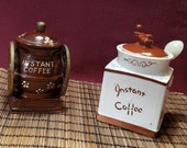 Pair Of Vintage Instant Coffee Lidded Ceramic Containers, Hand Painted, Glazed, Coffee Grinder Shape, Barrell With Wheels, Brown And White