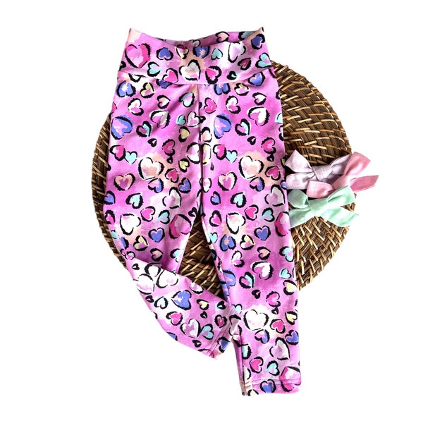Babyhug Cotton Lycra Knit Full Length Leggings With Hearts & Floral Print Pack Of 2 - Pink & Navy main image 1