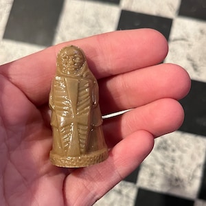 VINTAGE! Celluloid Religious Figurine Holding Cross