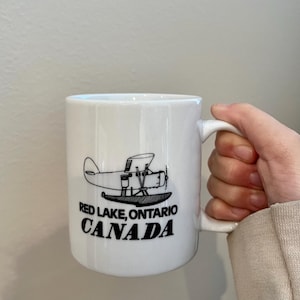 VINTAGE! Reed Lake, Ontario Canada Plane Mug