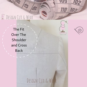 May include: A white fabric dress form with markings for sewing, showing the fit over the shoulder and cross back. The text "The Fit Over The Shoulder and Cross Back" is written in a circle around the dress form.