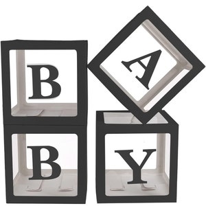 May include: Black and white 'BABY' block balloons. Each letter is in a clear plastic box with a black border.