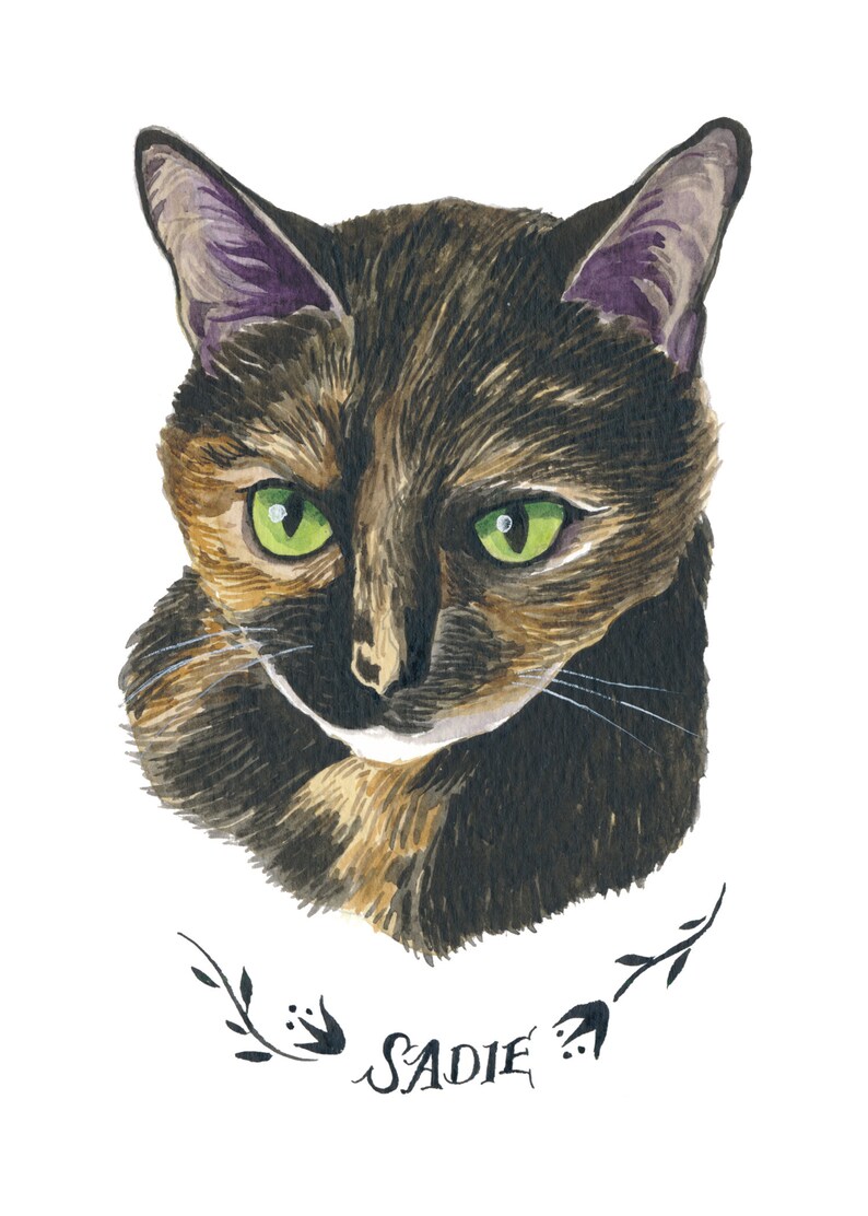 May include: Watercolor portrait of a tortoiseshell cat with green eyes. The cat has a mix of brown, black, and tan fur. The name "Sadie" is written in cursive below the cat's head, with floral accents.