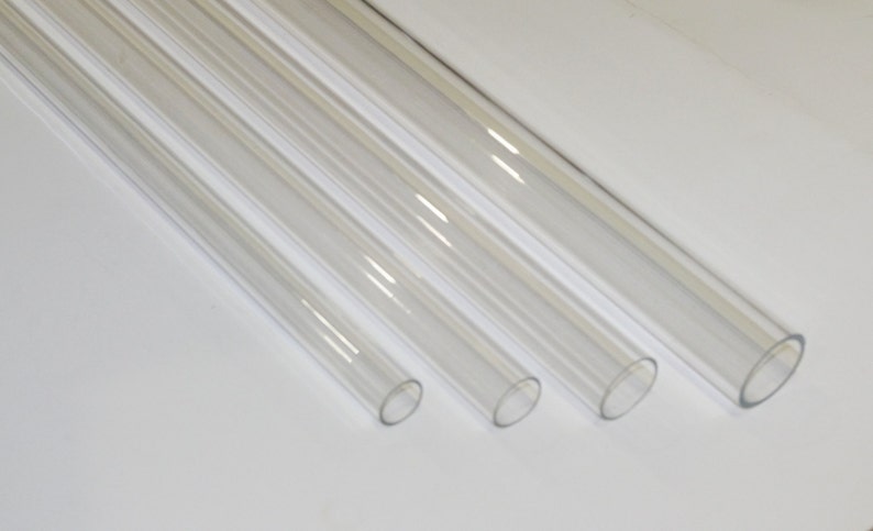 May include: Four clear plastic tubes of varying lengths and diameters.