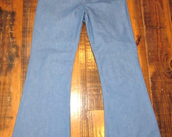 Pantalones vaqueros acampanados Levis vintage de los años 70 con etiqueta naranja, color azul claro y azul bebé, modelo 3231, talla 32".