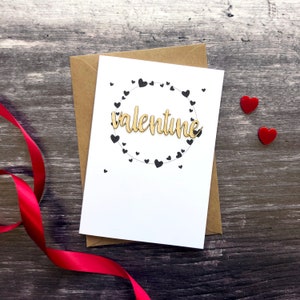 Biglietto di auguri in legno con parole di San Valentino