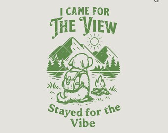 May include: Green graphic design with a dog wearing a backpack and looking at a mountain view. The text reads "I came for the view stayed for the vibe".