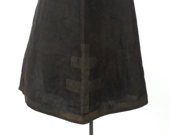 Black hood with Lorraine cross on Siegel hat rack - History
