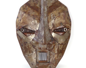 Contemporary gross metal mask - Folk art