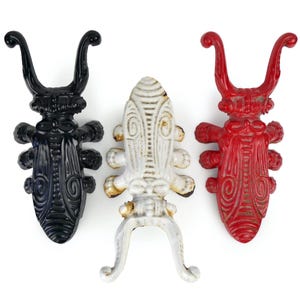 3 old metal Scarab boot jacks, to take off your shoes, standing up, with ease - Antiques - Retro objects - Collectibles
