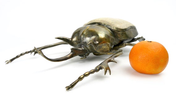 A Japanese Patinated Bronze Rhinoceros Beetle with Opening Back A Japanese Patinated Bronze Rhinoceros Beetle with Opening Back