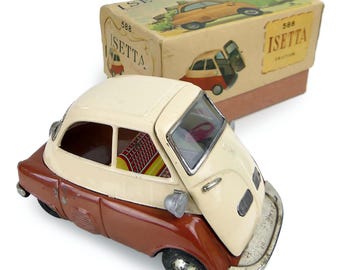 Vintage Ichiko Japan Tin Toy: 1961 Plymouth Ambulance Station