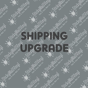 May include: A gray background with a white splatter pattern. The text "SHIPPING UPGRADE" is in black with a white dotted outline.