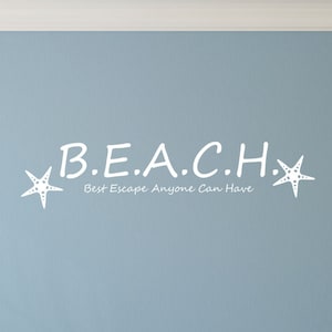 May include: White wall decal with the text "B.E.A.C.H. Best Escape Anyone Can Have" and two white starfish on either side of the text.