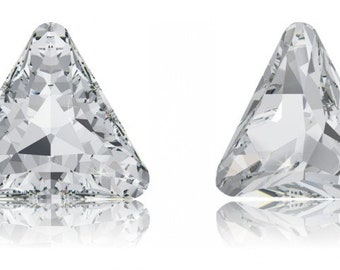 May include: Two clear triangular crystal shapes, each with a faceted design. The crystals are on a white background.