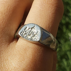 city under a dome signet ring