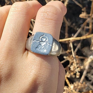 Flatwoods monster wax seal signet ring