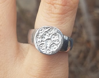 Trapped souls wax seal signet ring
