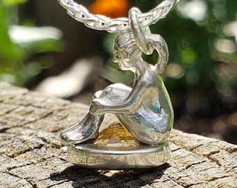 Citrine eye of horus seated figure pendant