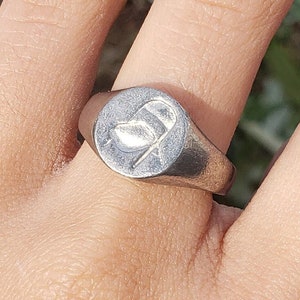 Folding chair wax seal signet ring