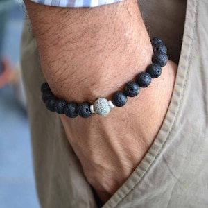 Lava stone and solid silver bracelet.