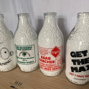 Vintage Advertising Milk Bottles