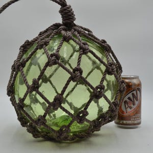 Vintage  Glass Fishing Float In Light Green 10"