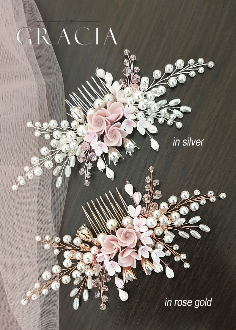 May include: Two bridal hair combs featuring pink flowers, pearls and crystals. The comb on the left is silver, and the comb on the right is rose gold.