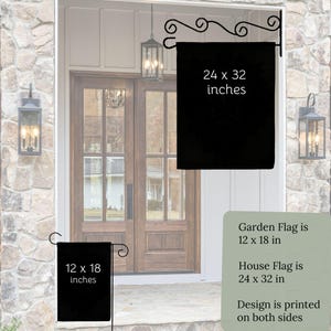 a large wooden door with a black garden flag hanging from the ceiling. The flag is 24 x 32 inches in size. The image also includes text that provides information about the size of the garden flag and the house flag.
