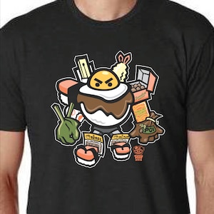 May include: A black t-shirt with a cartoon illustration of a fried egg with a grumpy face. The egg is wearing a brown sauce and is surrounded by various Japanese food items, including sushi, seaweed, and a shrimp tempura. The text "SUMO FUN 2018" is printed on the bottom of the shirt.