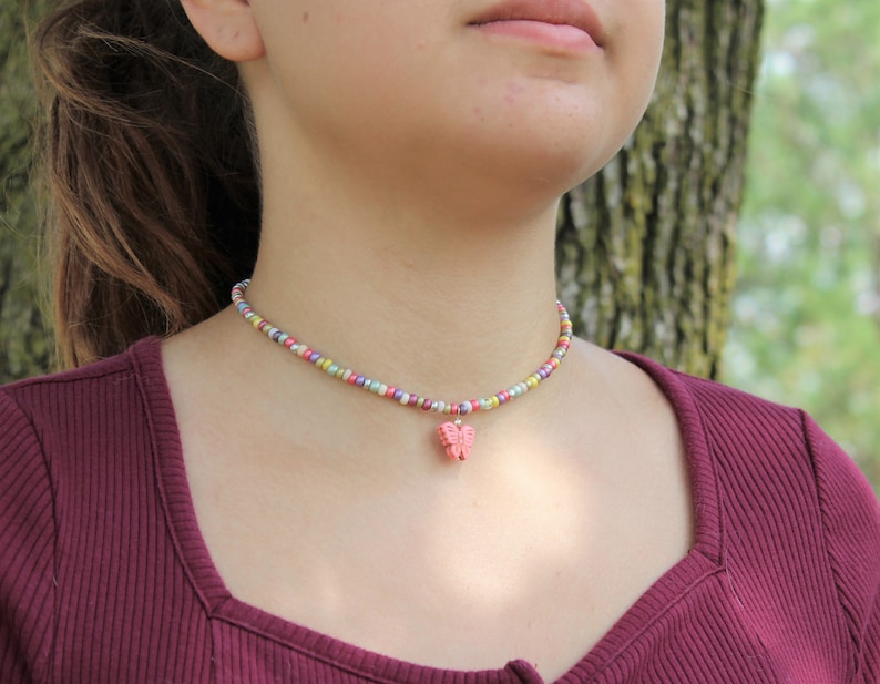 Butterfly charm necklacemulti-color glass beadspink howlite butterflygift for herboho teen giftinsect charmadjustablecasualfun