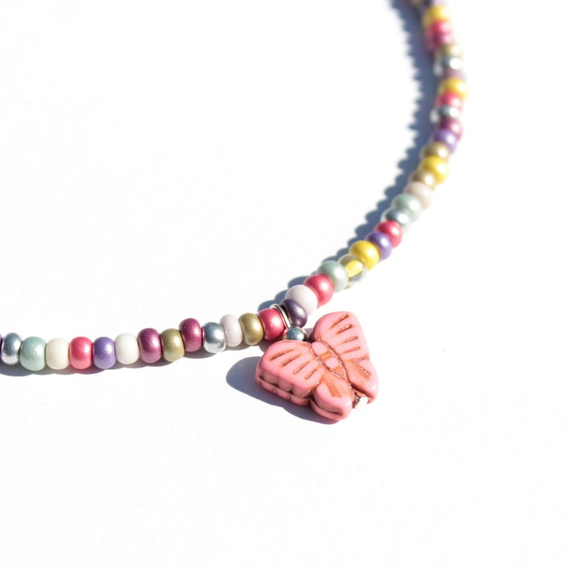 Butterfly charm necklacemulti-color glass beadspink howlite butterflygift for herboho teen giftinsect charmadjustablecasualfun