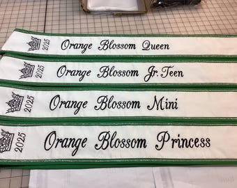 Pageant sashes/ Trim/ Crown with year/ silver rhinestones single row front and back there Rhinestones not the plastic mesh