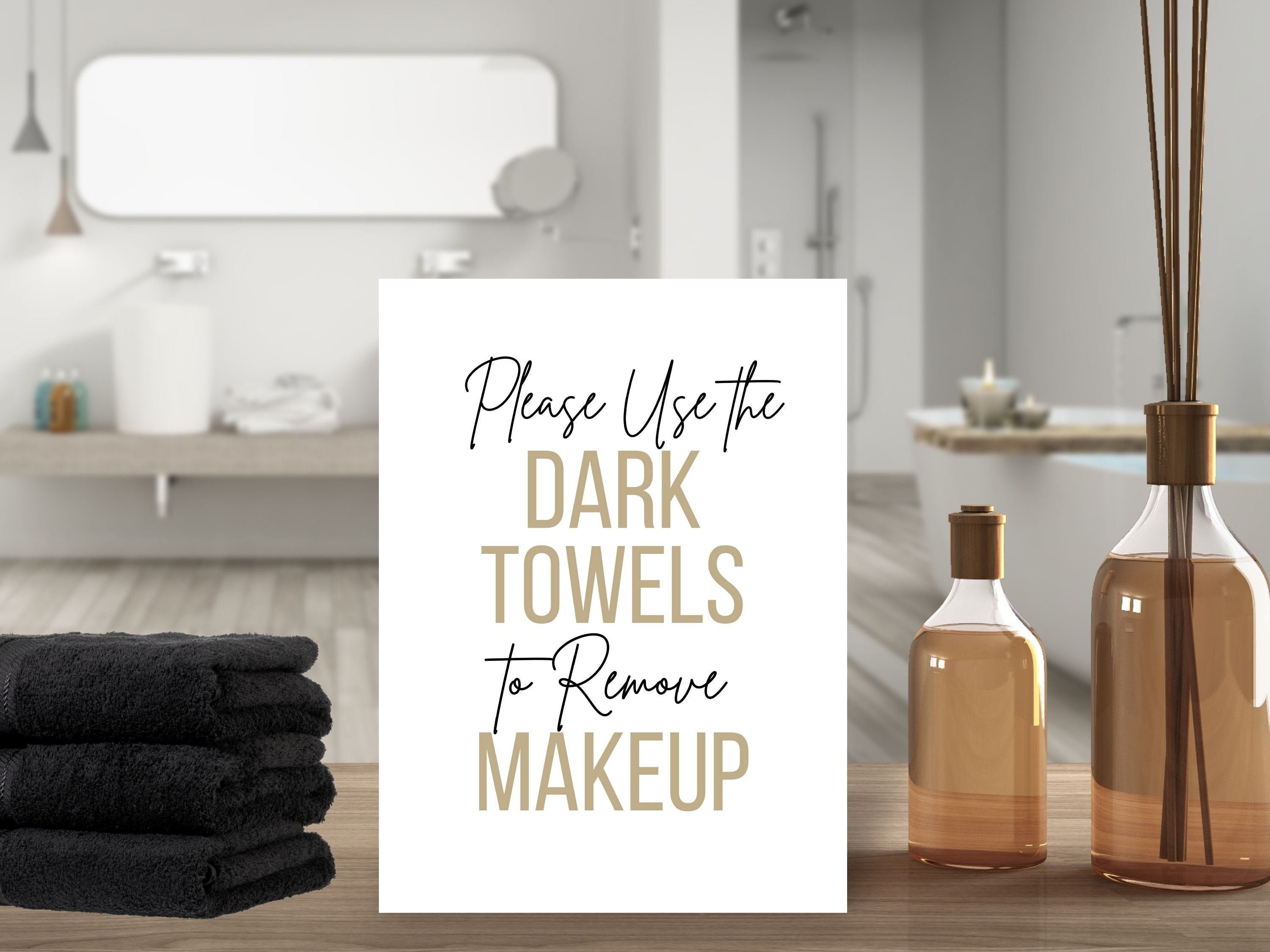 airbnb-dark-towels-to-remove-makeup-airbnb-rental-home-bathroom-sign