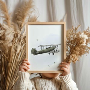 Green Biplane Takeoff Print | Vintage Wall Art for Kids’ Room | Nostalgic Aviation Decor and Classic Airplane Illustration