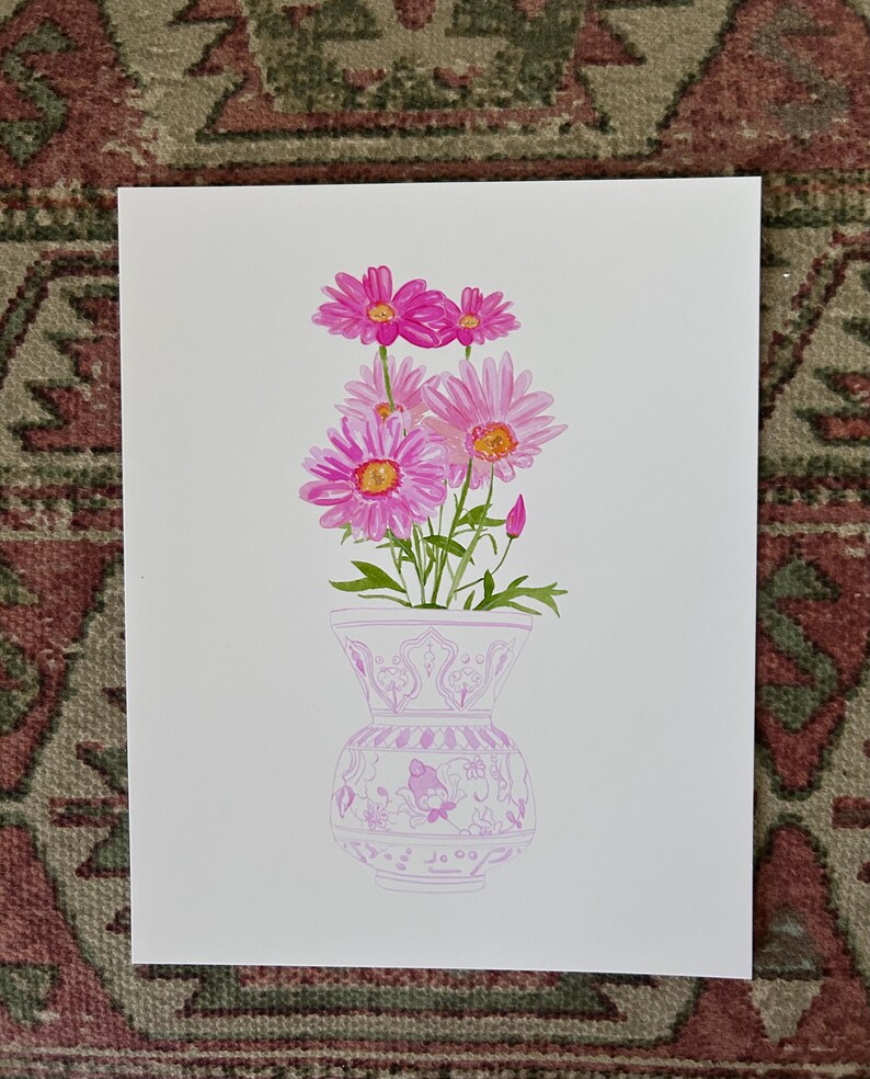 May include: A watercolor painting of a bouquet of pink flowers in a pink and white patterned vase.