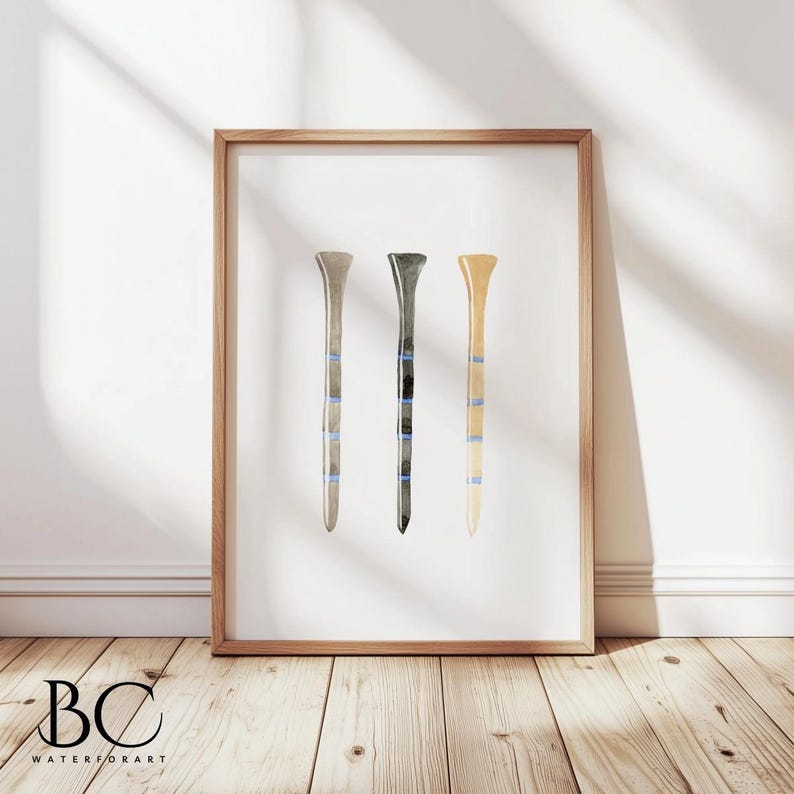 May include: A watercolor painting of three golf tees in different colors: beige, gray, and brown. Each tee has a blue stripe around the top.