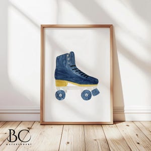 May include: Watercolor painting of a blue roller skate with black laces and yellow accents. The artwork is framed in a light brown wooden frame, set against a white background and a wooden floor.