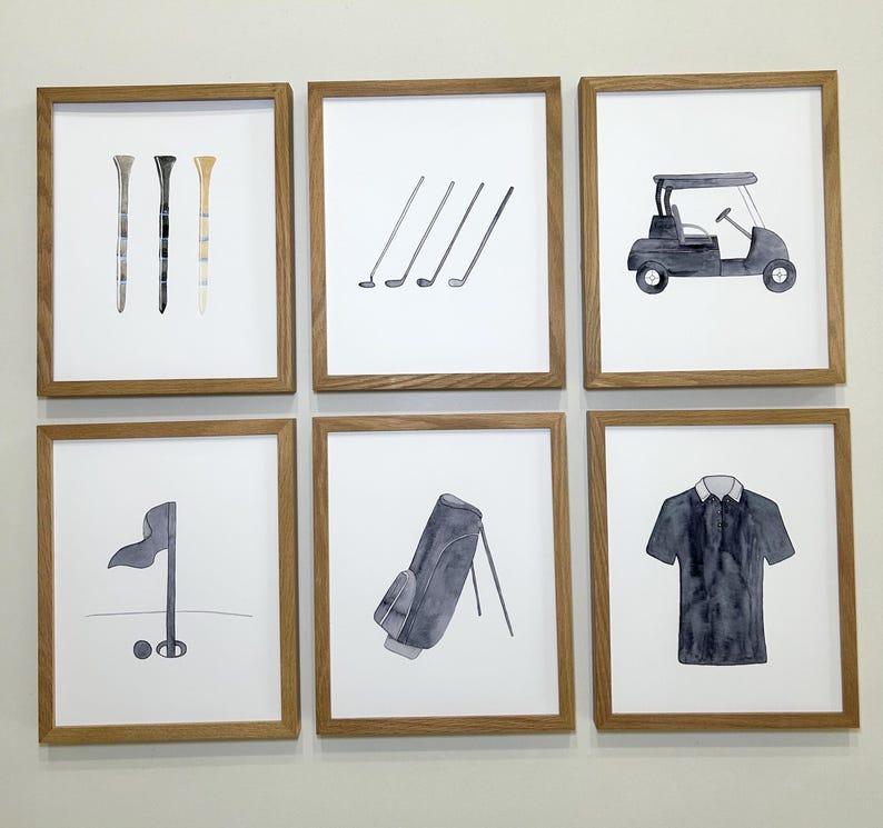May include: Six framed prints with a golf theme. The prints feature a golf cart, golf clubs, a golf bag, a golf flag, golf tees, and a golf shirt.