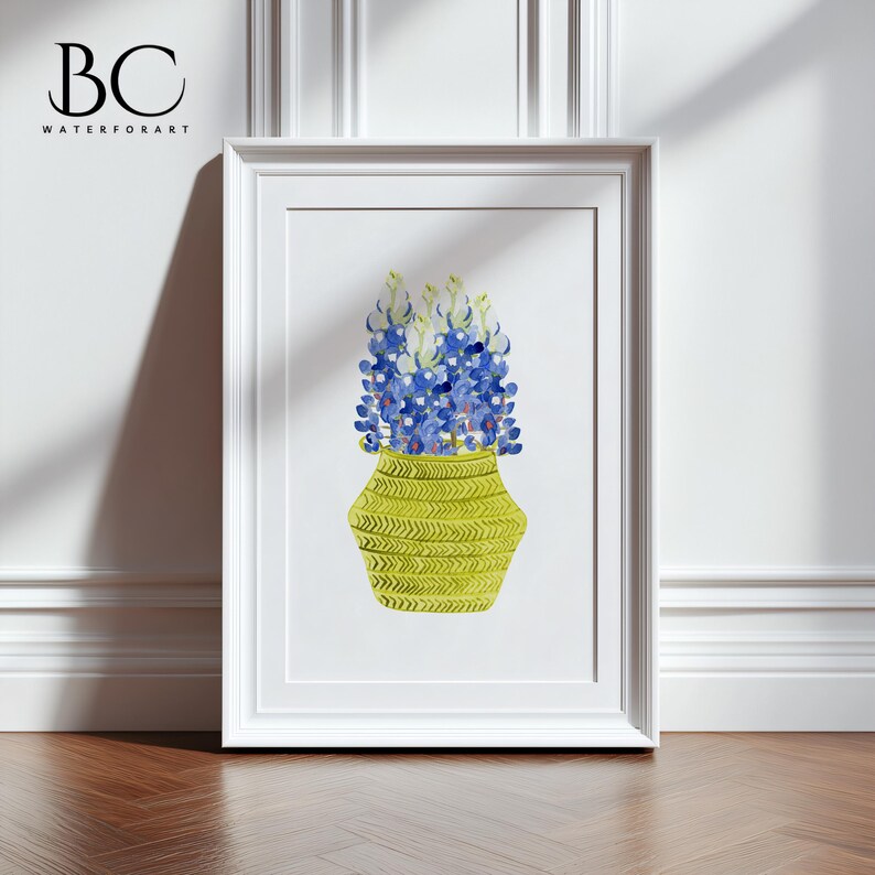 May include: A watercolor painting of a bouquet of bluebonnet flowers in a yellow vase with a chevron pattern. The vase is on a white background.