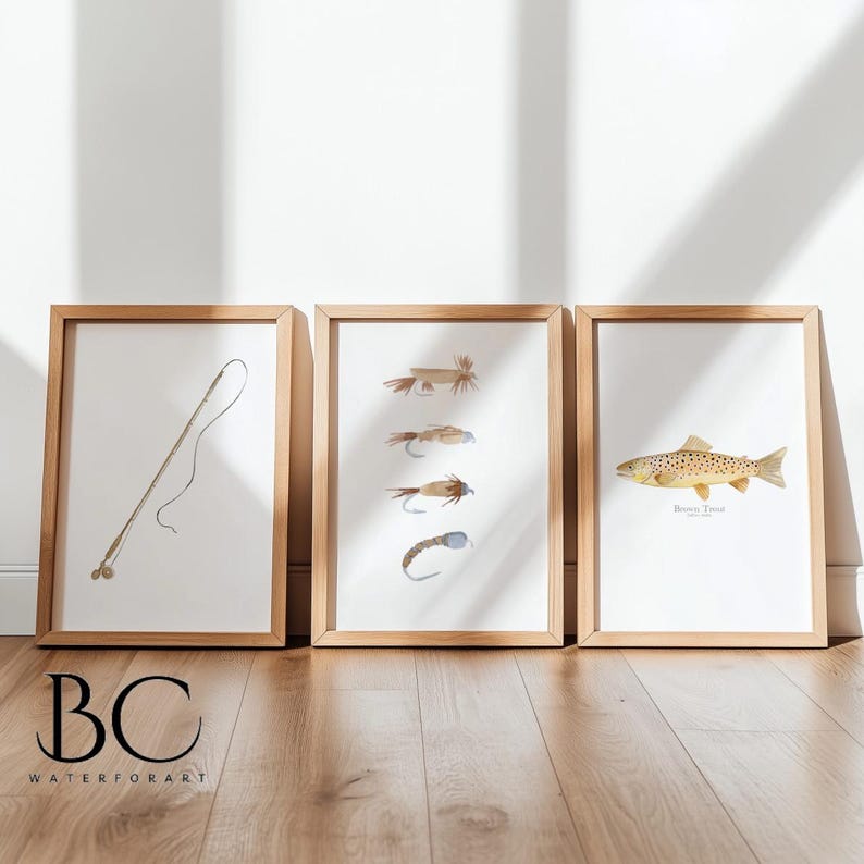 May include: Three framed prints with a fishing theme. The left print shows a fishing rod and line. The center print shows five different fishing flies. The right print shows a brown trout with the text "Brown Trout" below it.