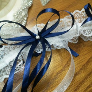 Pretty white and dark blue lace garter