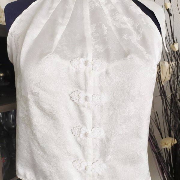 Top / bustier original en brocart de couleur blanc cassé / écru clair aux motifs dragons sur fleurs