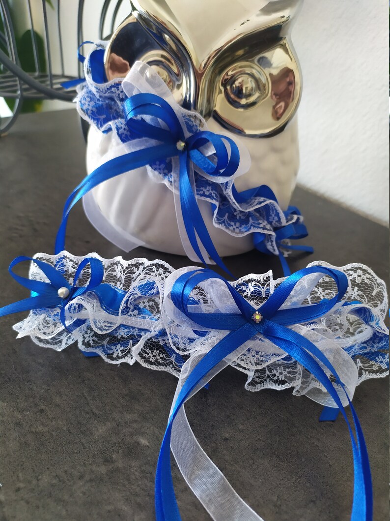 Pretty duo of white lace garters trimmed with royal blue satin ribbon bows image 4