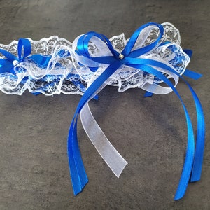 Pretty duo of white lace garters trimmed with royal blue satin ribbon bows image 3