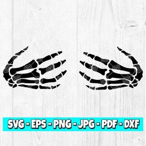 May include: Two black skeleton hands with outstretched fingers, facing each other, on a white woodgrain background.