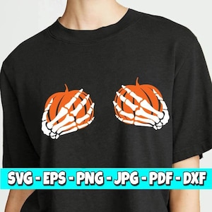 May include: Black short-sleeved shirt featuring a Halloween-themed design. The design includes two orange pumpkins with white skeleton hands. Below the design is the text: SVG - EPS - PNG - JPG - PDF - DXF.