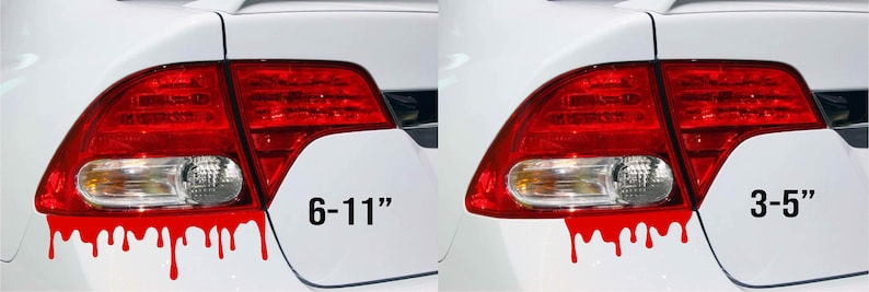 May include: Two white cars with red dripping paint decals on the back. The decals are shaped like blood drops. The text "6-11" and "3-5" are printed on the cars.