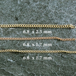 May include: Three gold chains of different sizes laid out on a gray textured surface. The chains are 6.8 mm wide and 2.5 mm, 1.7 mm, and 1.7 mm thick.